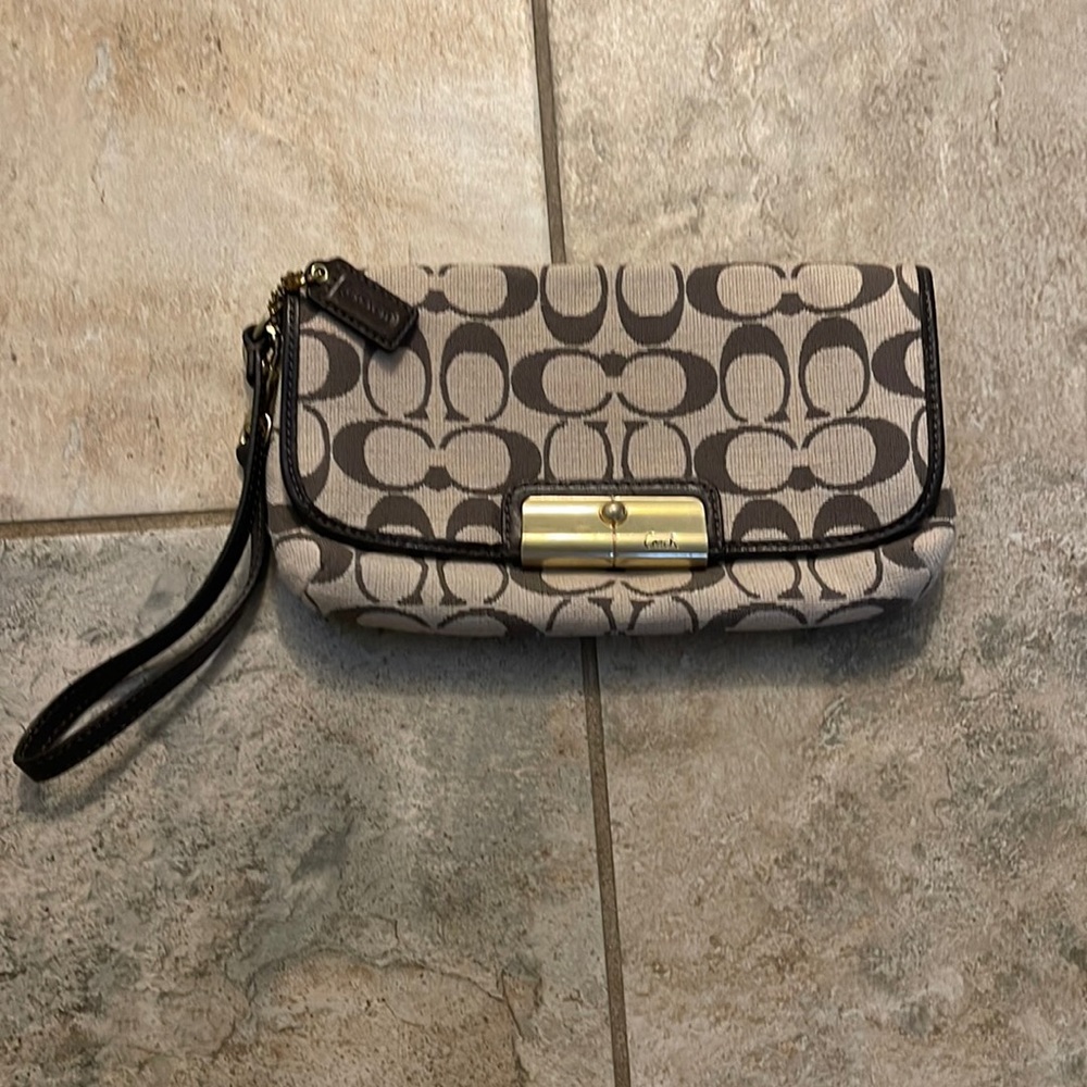 Women’s Coach signature wristlet